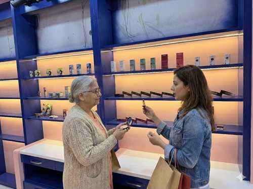 Customers shopping branded cosmetics at Styloz store